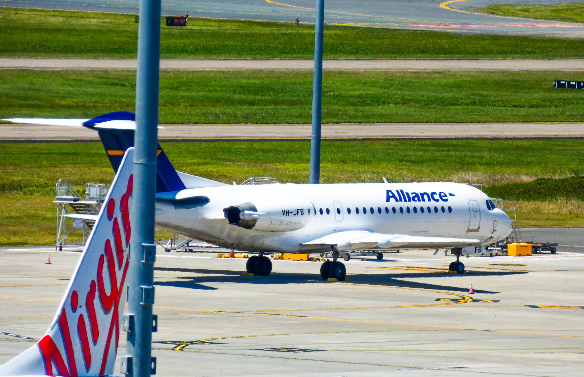 Alliance Airlines VH-JFB at YBBN by SingingAvgeek