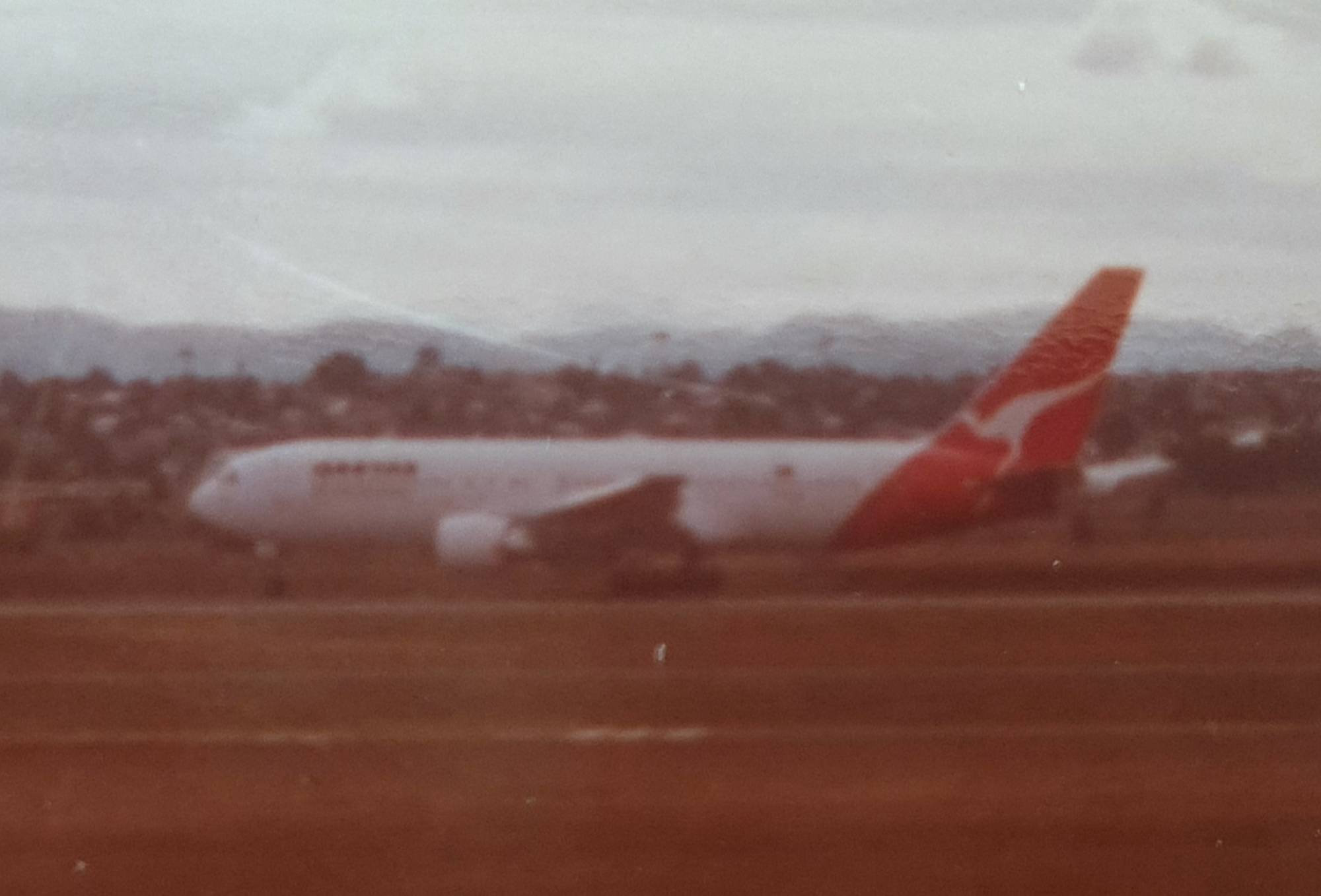 Qantas VH-EAJ at YBBN by SingingAvgeek