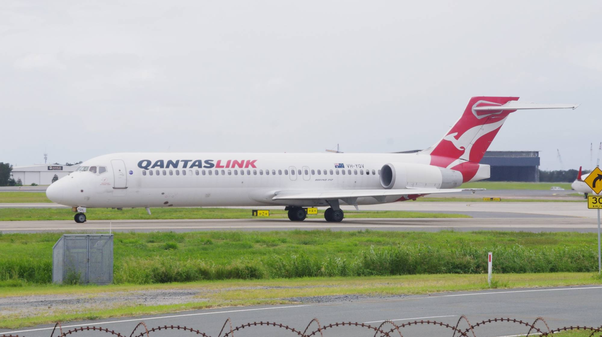 QantasLink (National Jet Systems) VH-YQV at YBBN by SingingAvgeek
