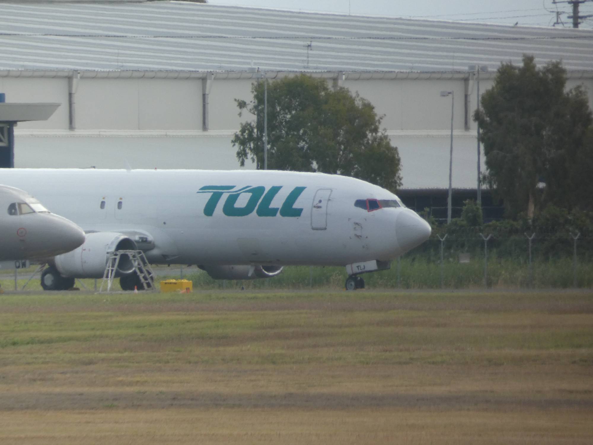 Toll Air Freight (Airwork) ZK-TLJ at YBBN by SingingAvgeek