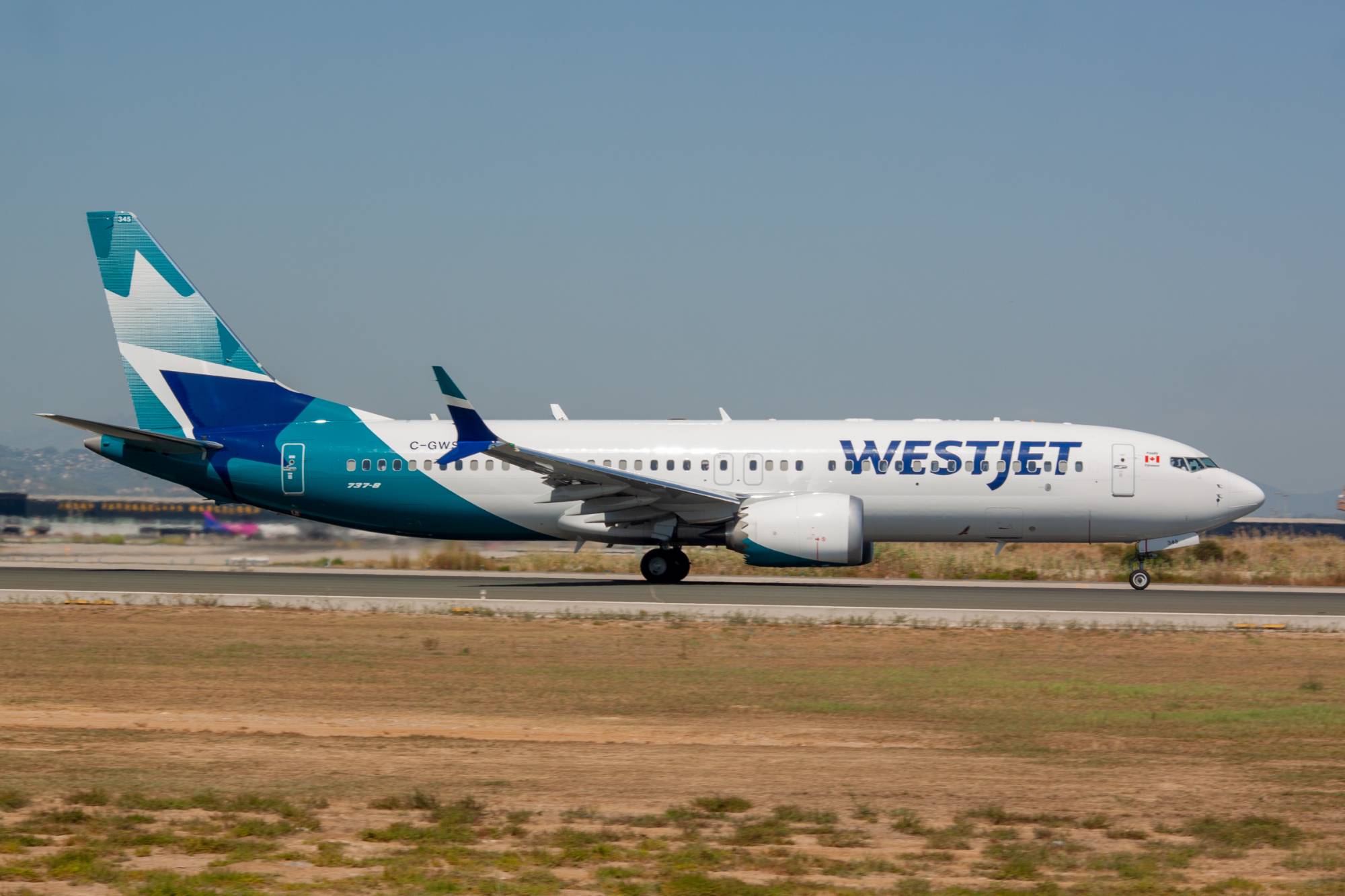WestJet C-GWSI at LEBL by jorgealvarezsan