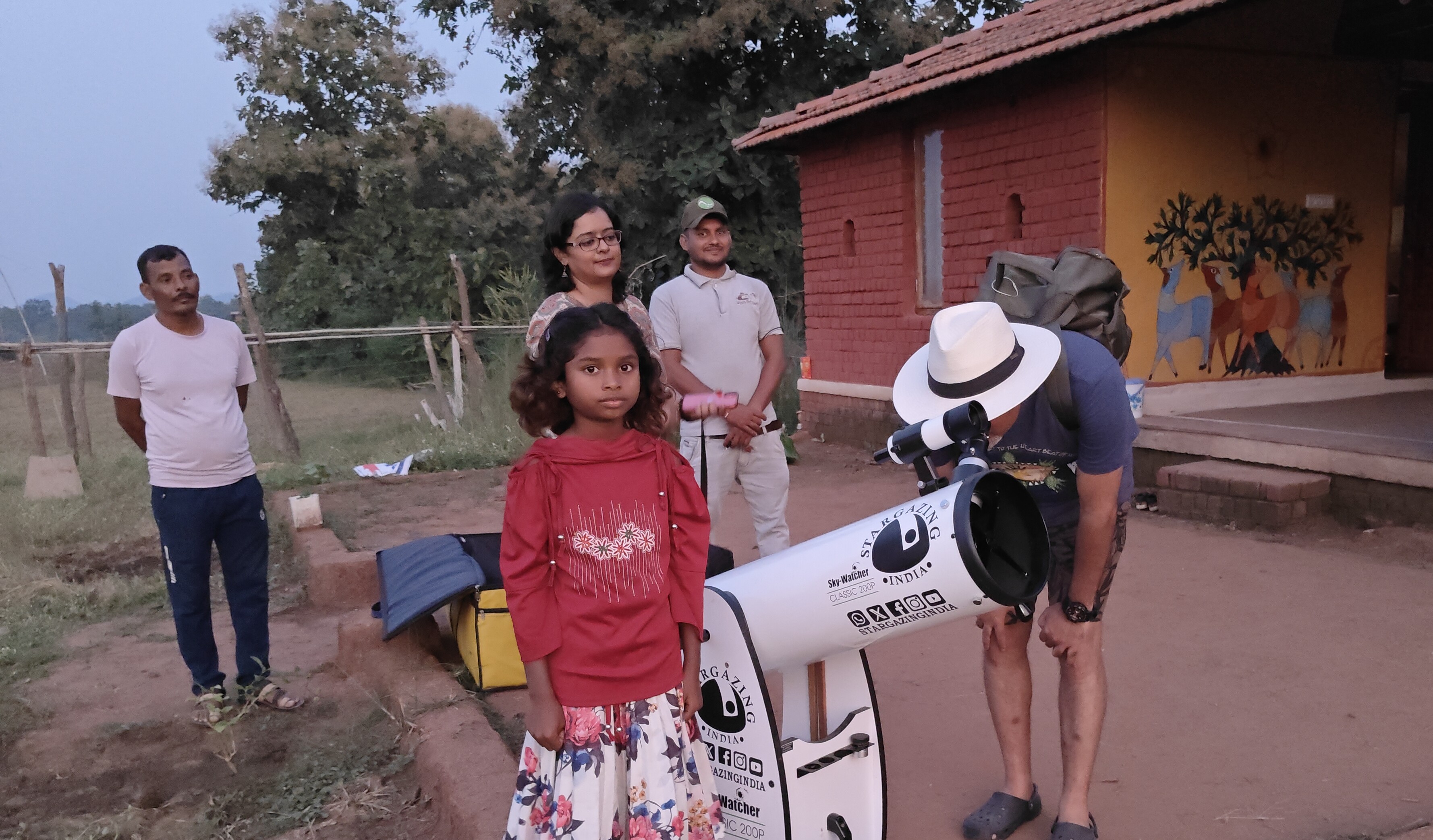 Chhedka's youngest ASTRO GUIDE with guests showing them Venus through Telescope