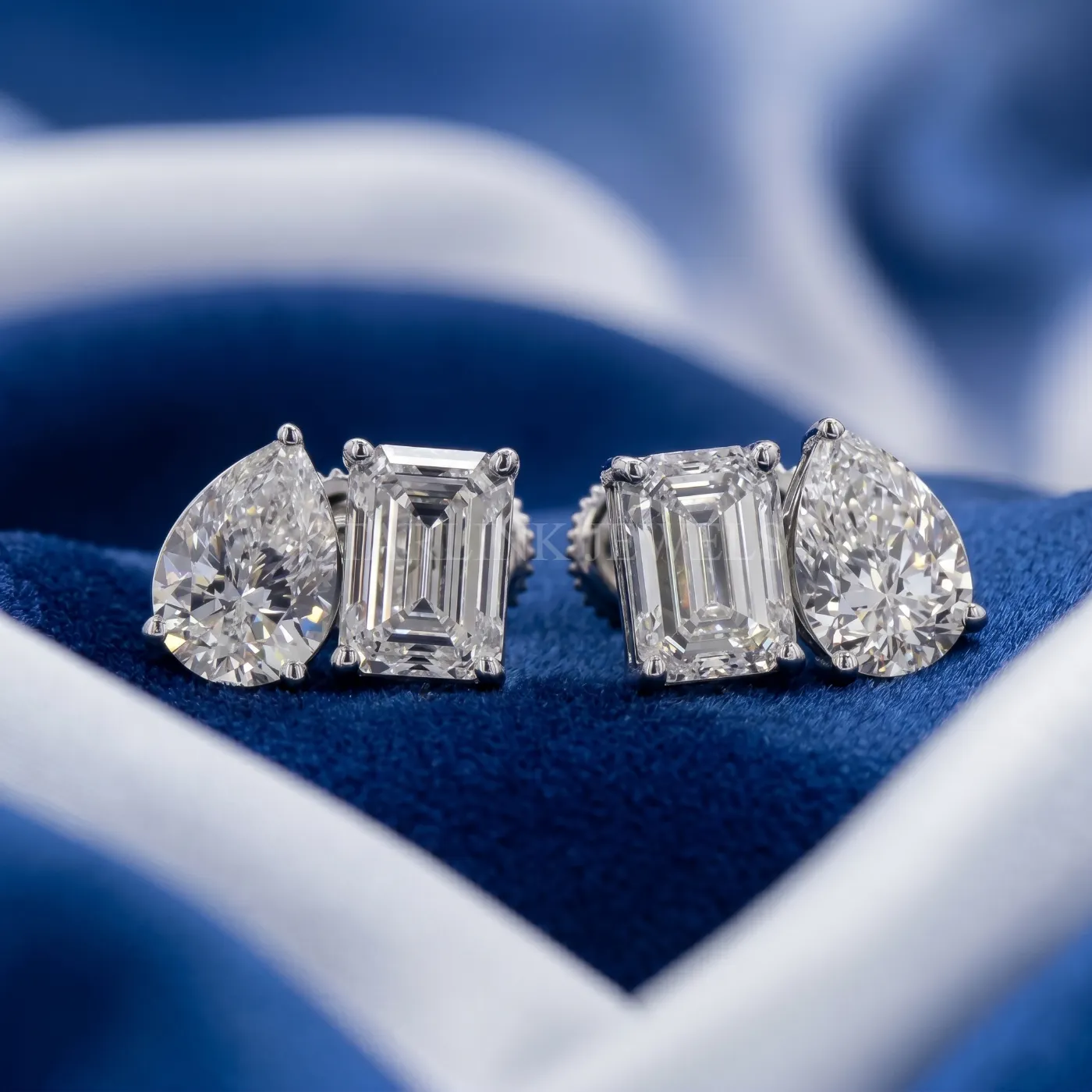 Two-Stone Emerald & Pear Cut Diamond Earrings
