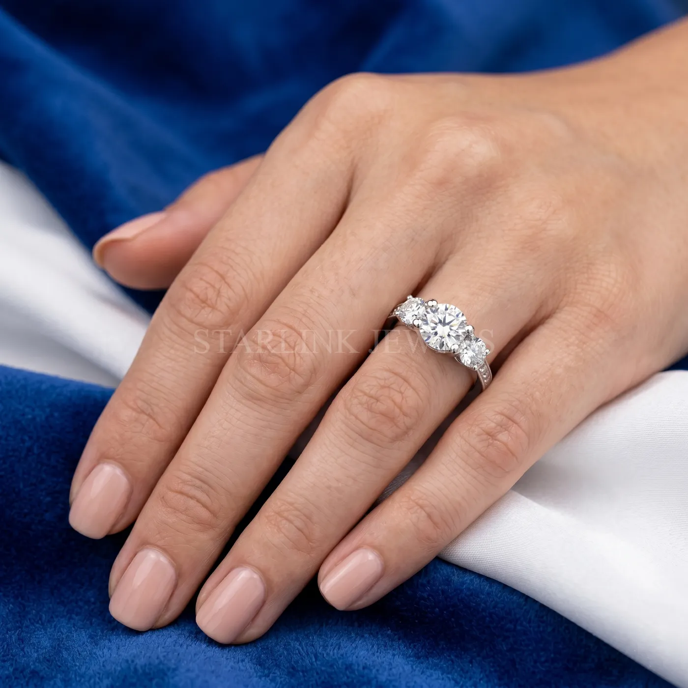 Three-Stone Round Diamond Ring
