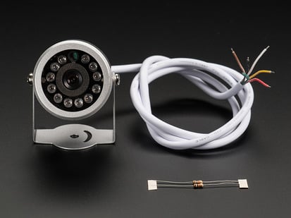 Weatherproof TTL Serial JPEG Camera with NTSC Video and IR LEDs - Weatherproof camera with mounting bracket and ring of LEDs next to resistors