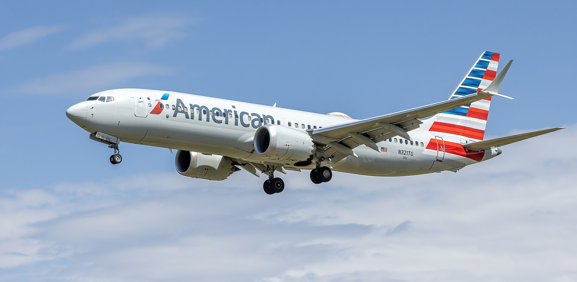 American Airlines Boeing 737-8 MAX approaching the runway with landing gear extended.