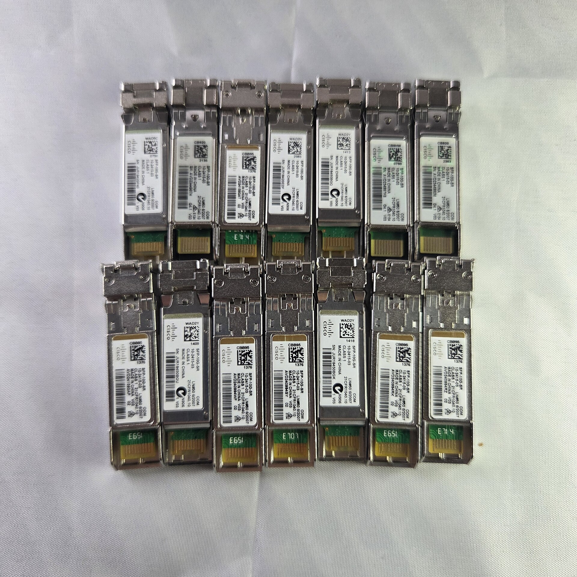 Cisco optical transceiver modules illustrating fiber-optic networking equipment