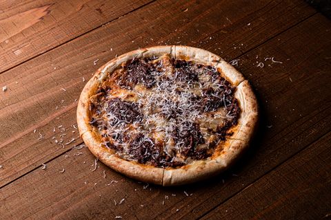 Homemade pulled pork meat pizza