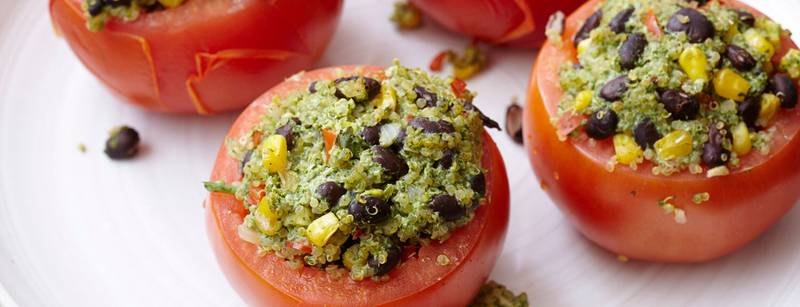 Quinoa-Stuffed Tomatoes with Spicy Cilantro Pesto