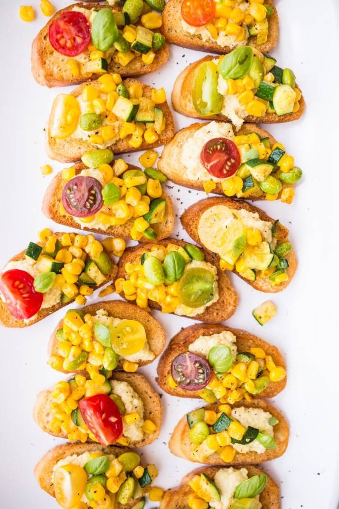 Crostini with Macadamia Ricotta and Corn-Zucchini Succotash