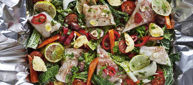 Fish with vegetables baked in foil
