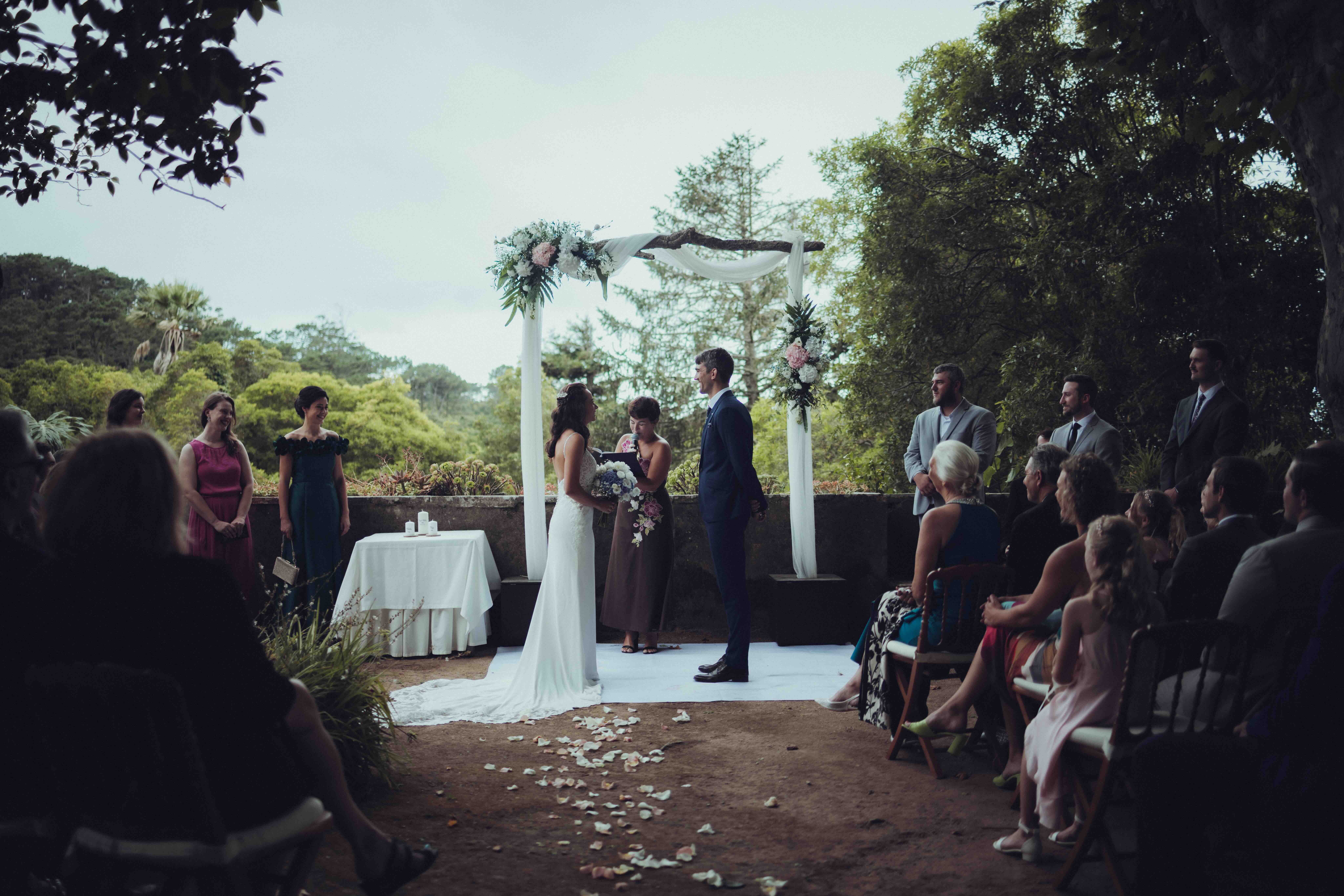 A couple getting married at their ceremony.