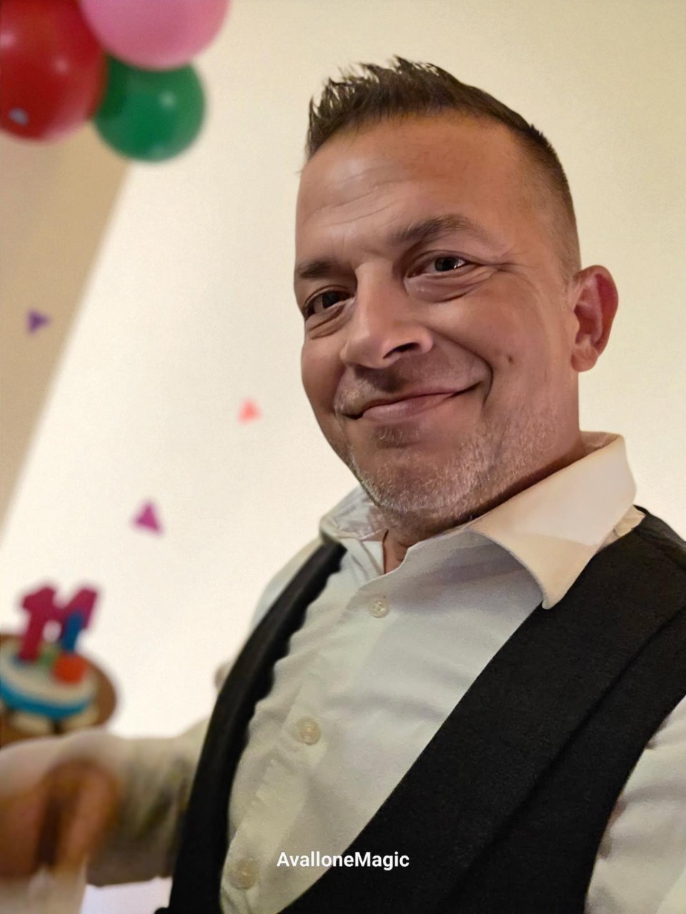 Chris Avallone performing a magic show for children at a birthday party
