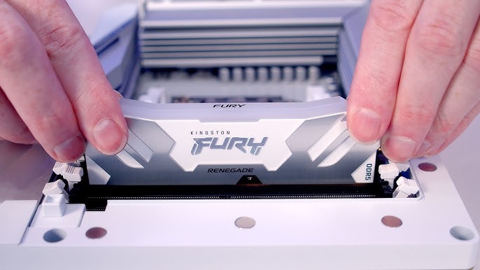 Сервис за Компјутери и Лаптопи - A person working on a disassembled laptop.