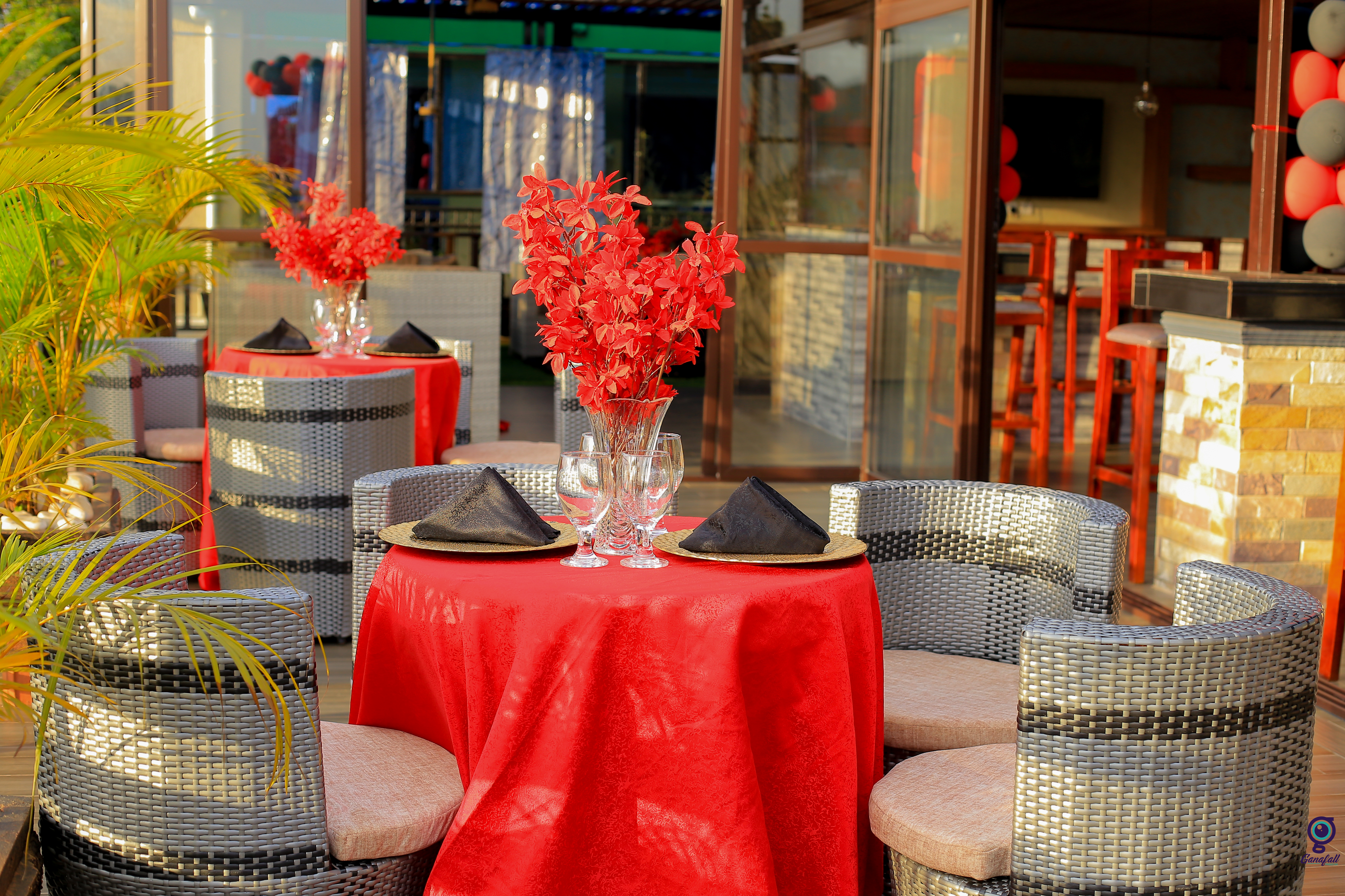 A corporate group collaborating during an outdoor team building exercise.