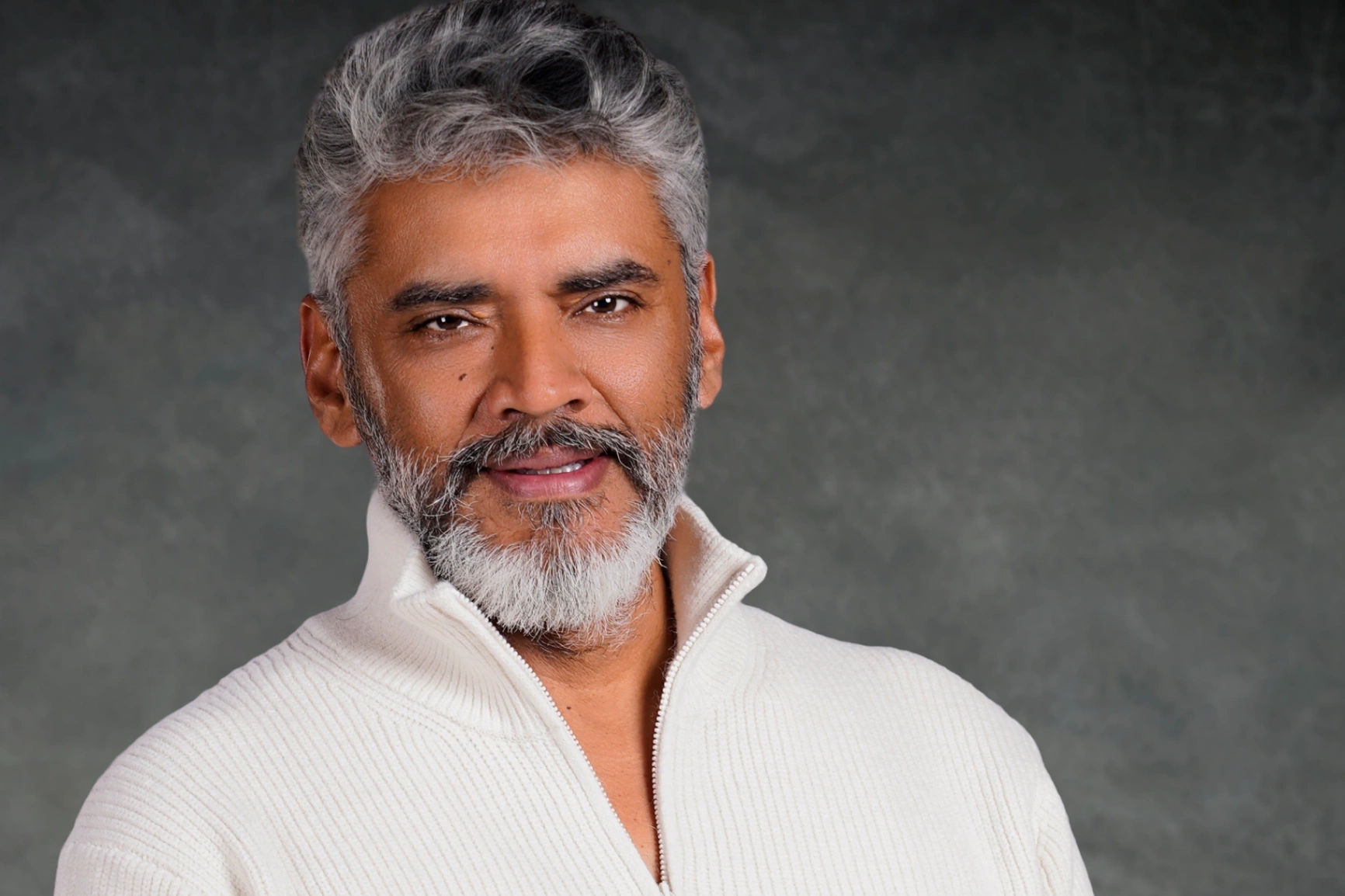 Headshot of Faiz Ahmad, the photographer behind FreshMint Studios.