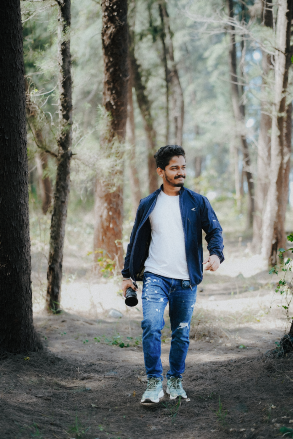 Headshot of Prasad Kadam, the photographer behind PSD STUDIOS.