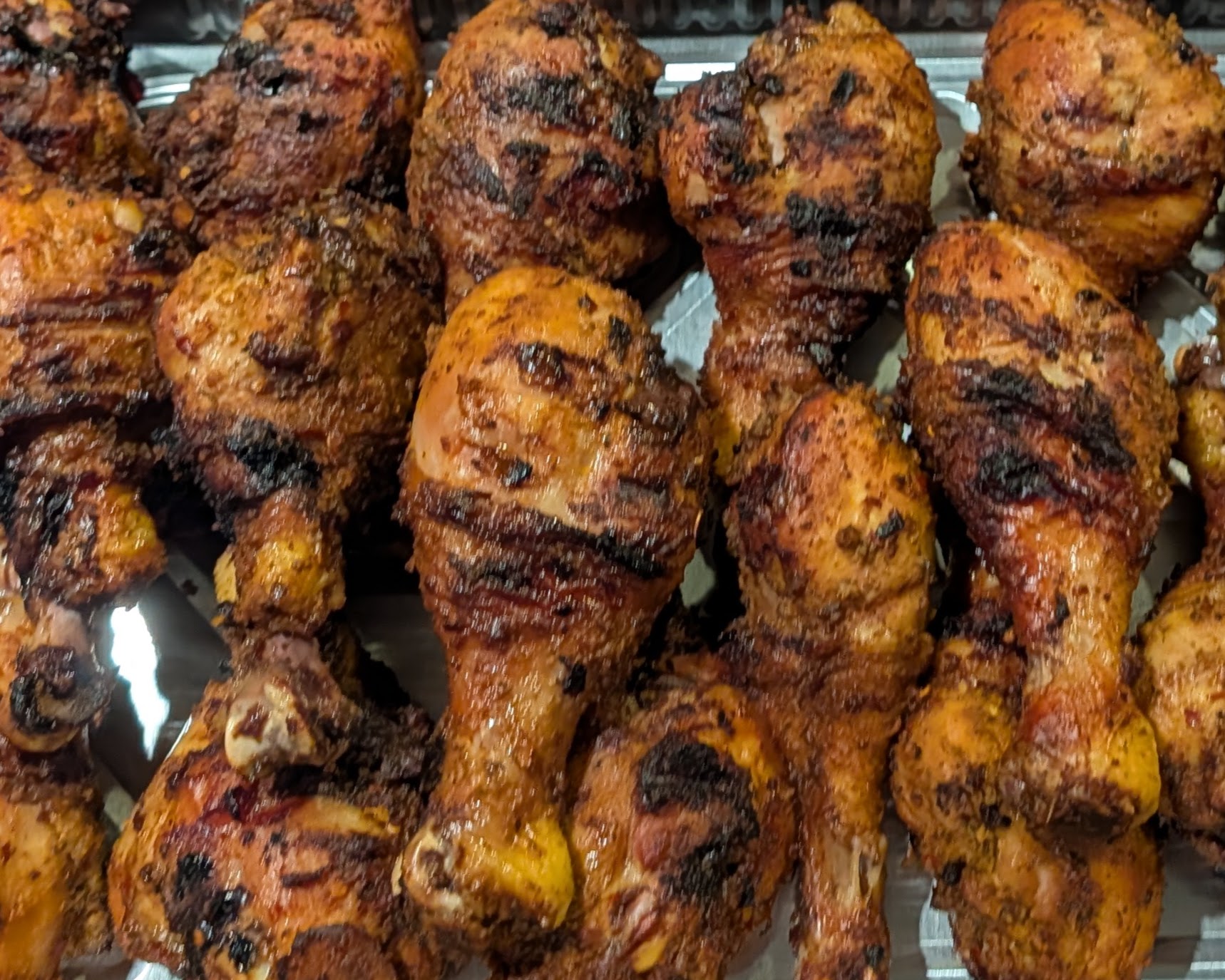 Image of a half tray of Smoked Drumsticks.