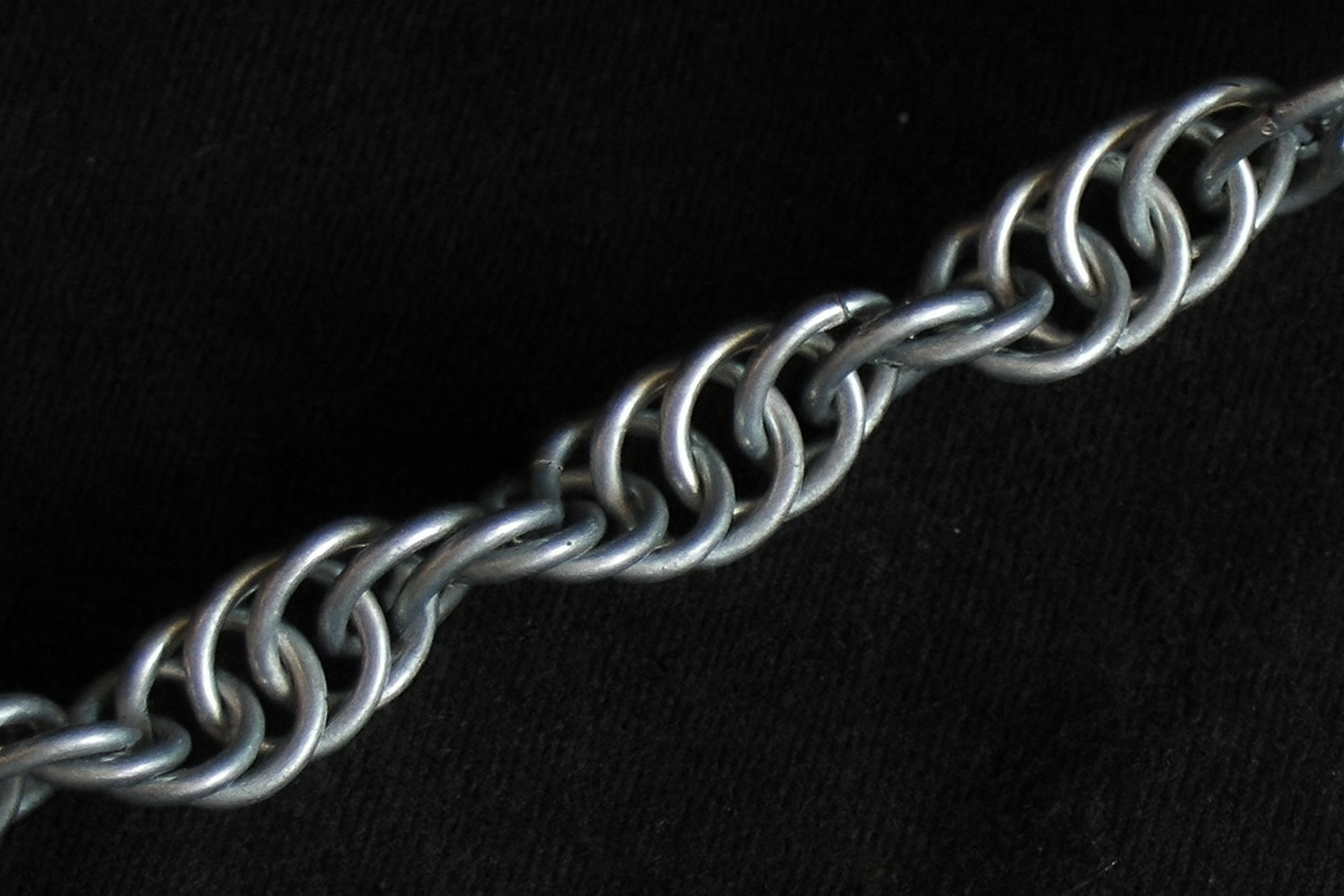 A spiral chainmaille weave.