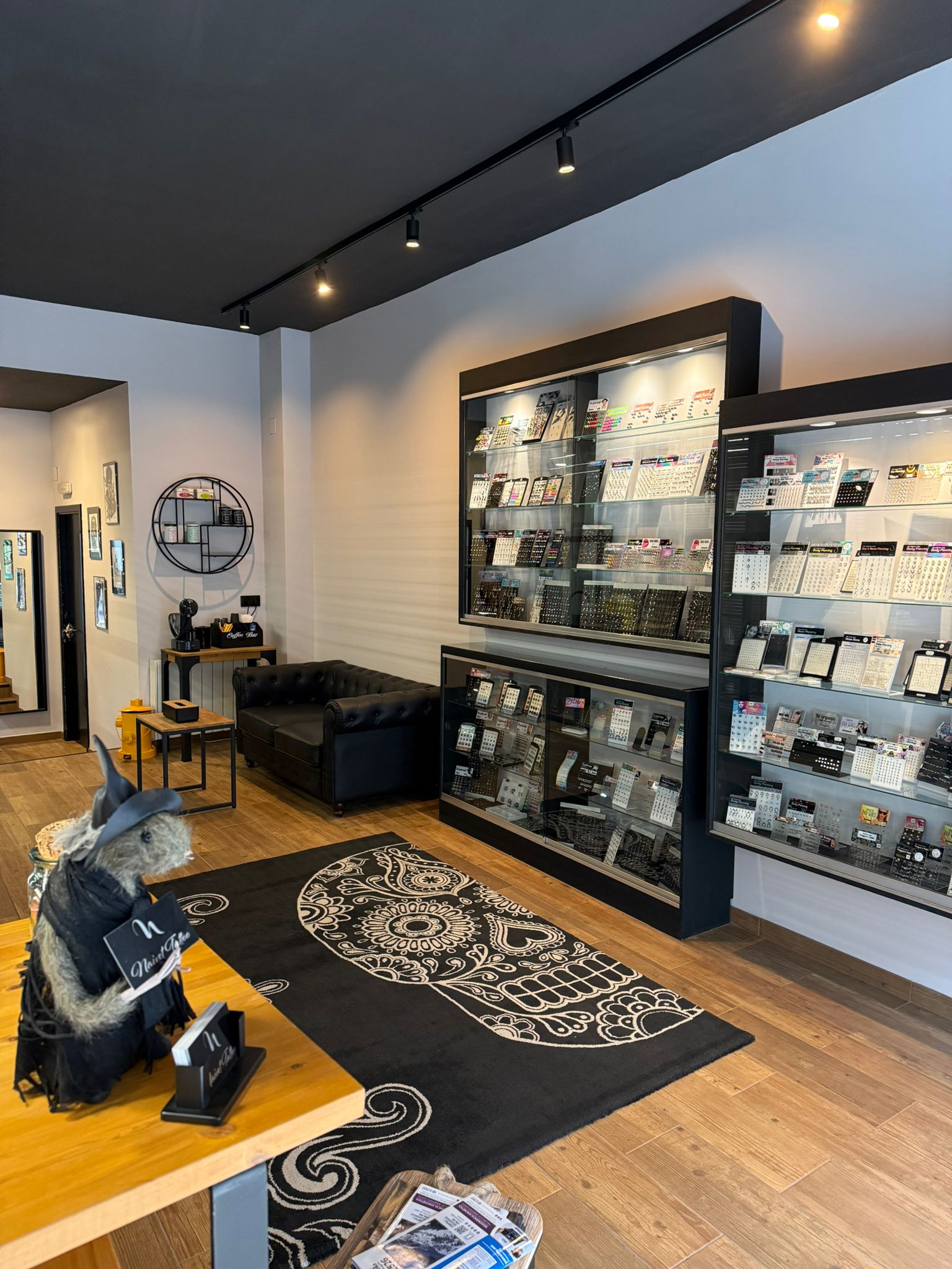 Tattoo workstation with a chair and equipment.