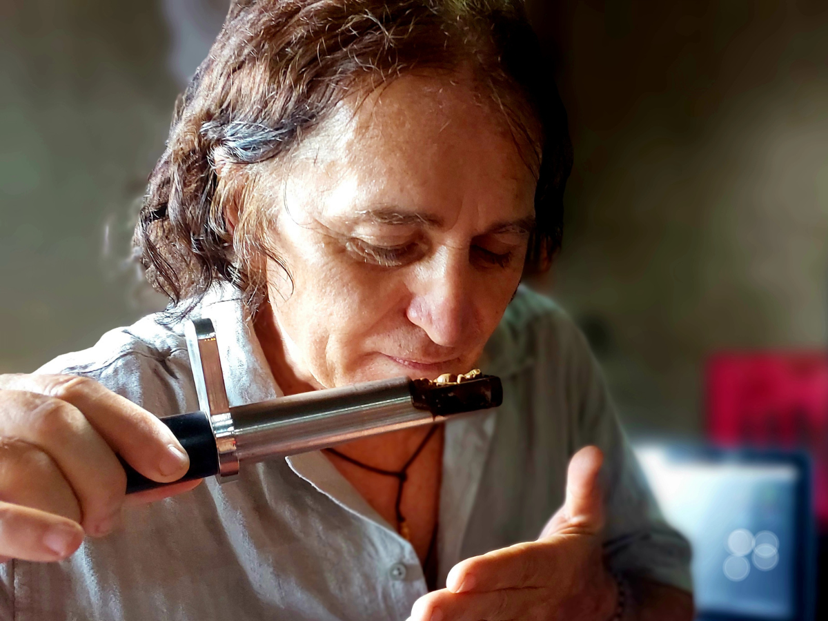 Freshly roasted coffee beans being processed.