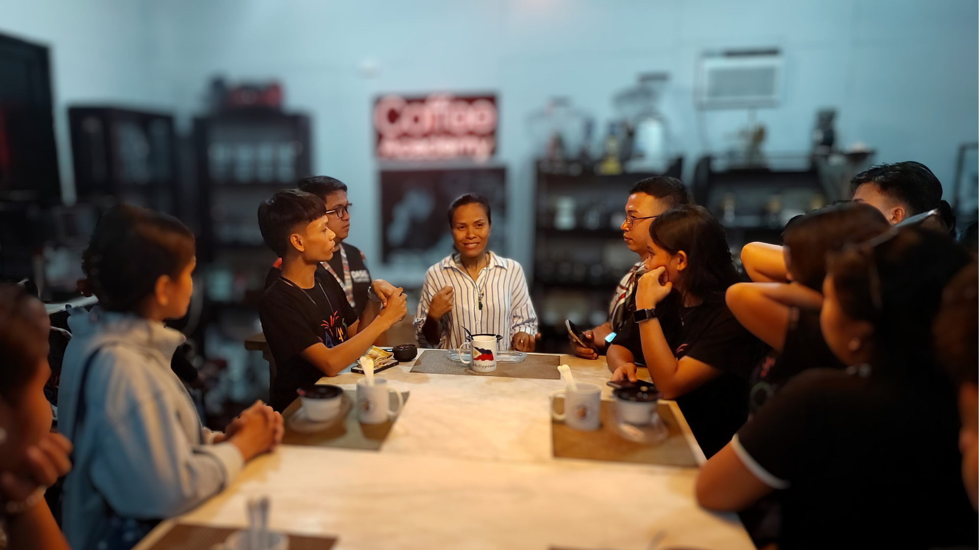 A group of students in a barista training class.