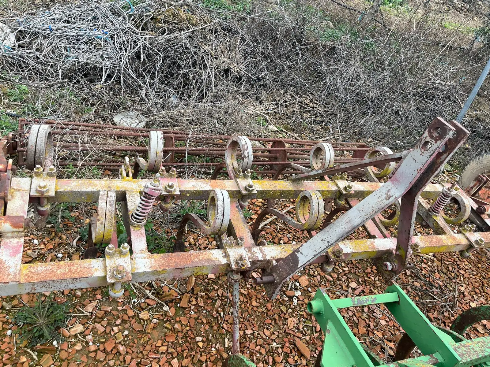Cultivador de 11 brazos de rosco de 27 y rulo | cultivadores
