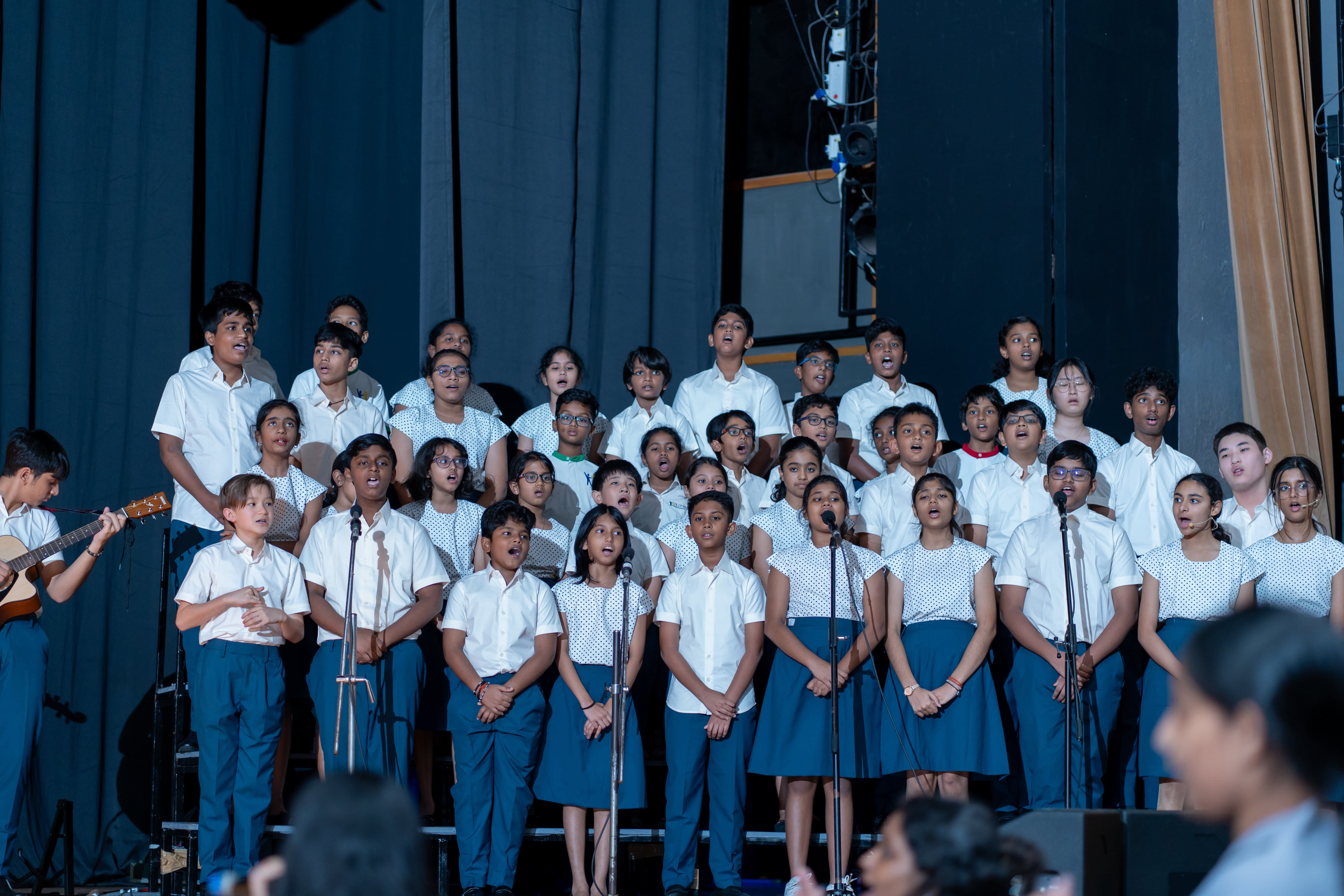 Students performing on stage