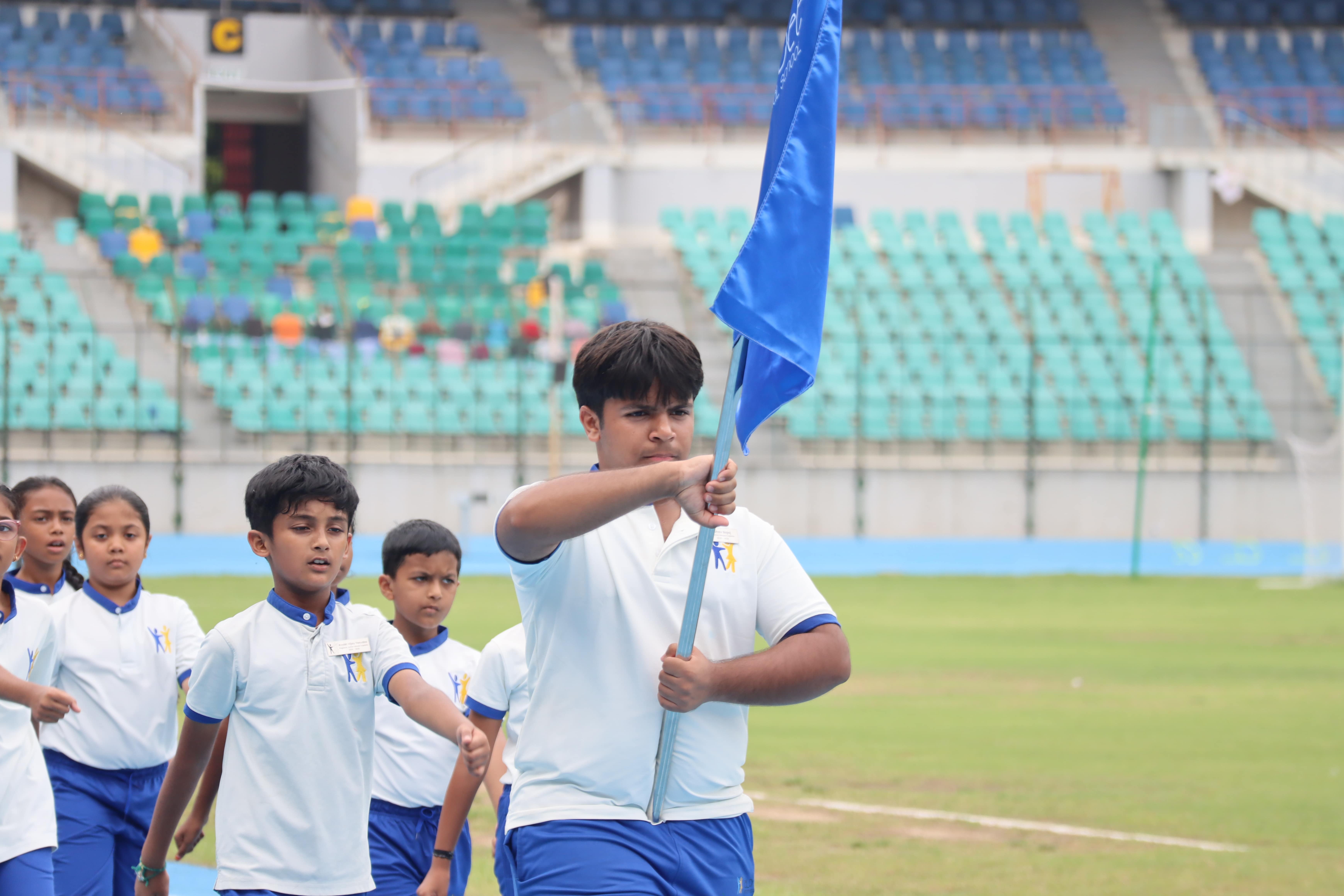 students march past