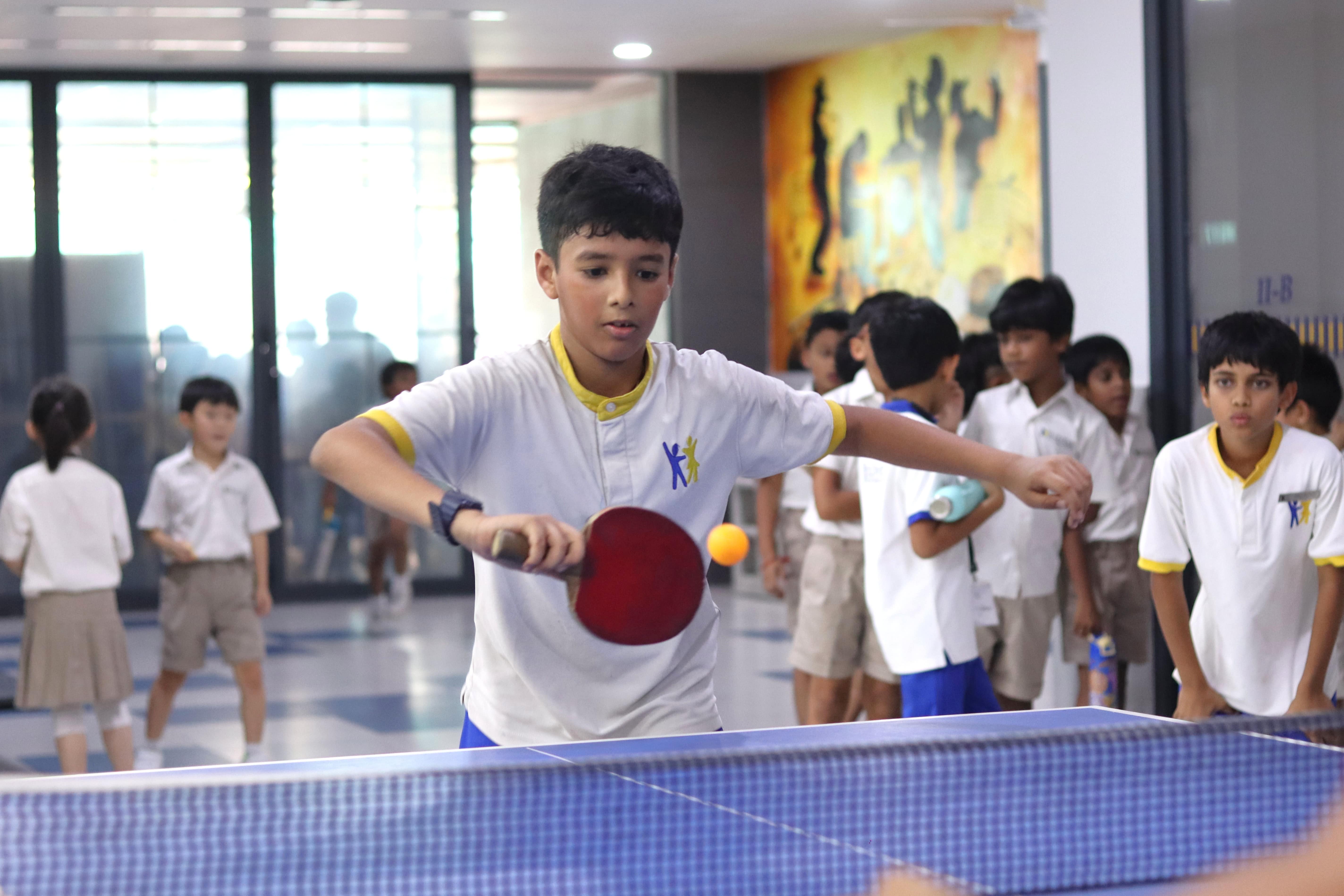 students playing football