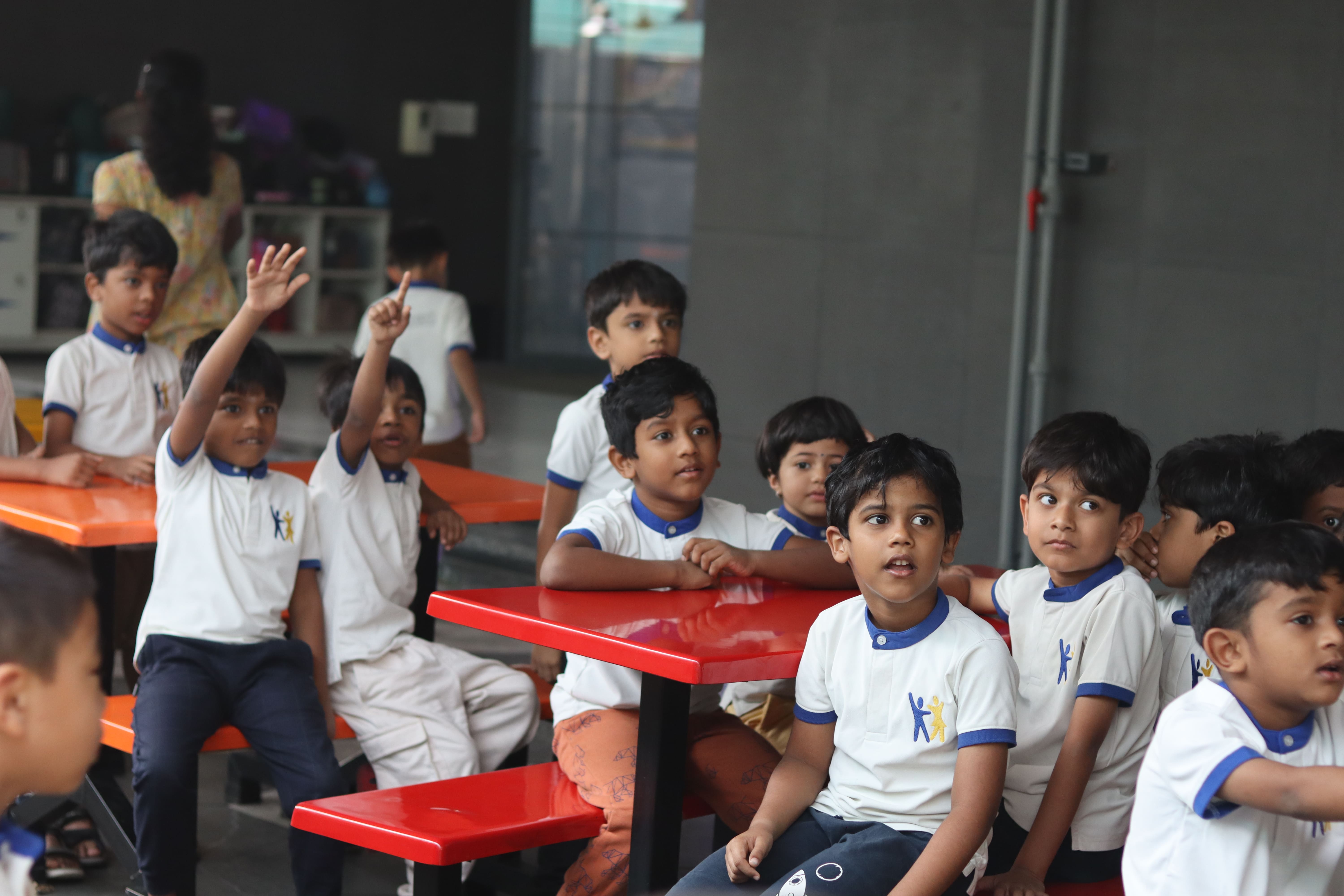 students playing football turf