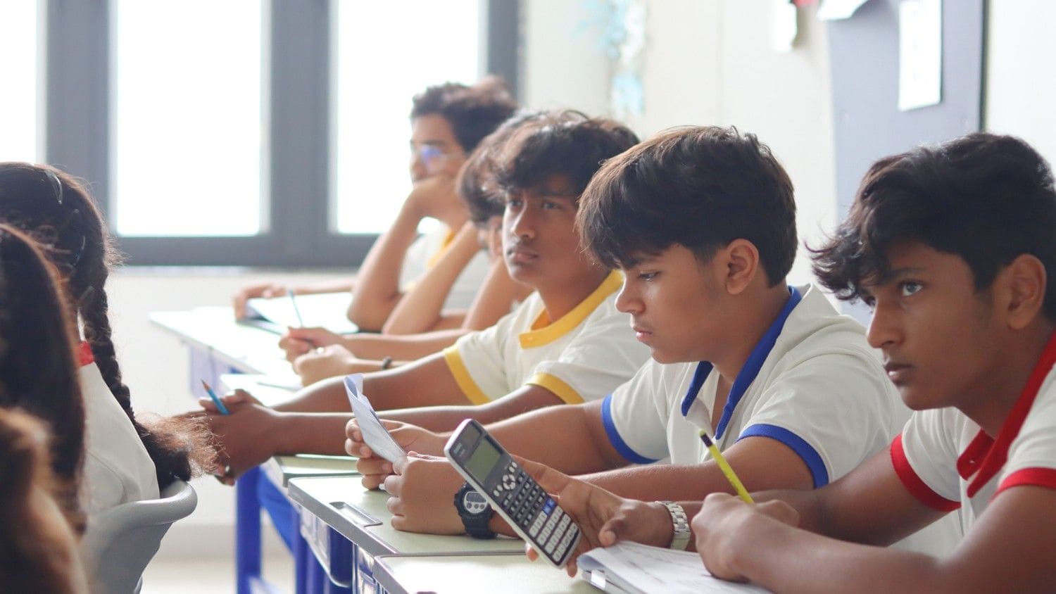 Students in a lively classroom discussion