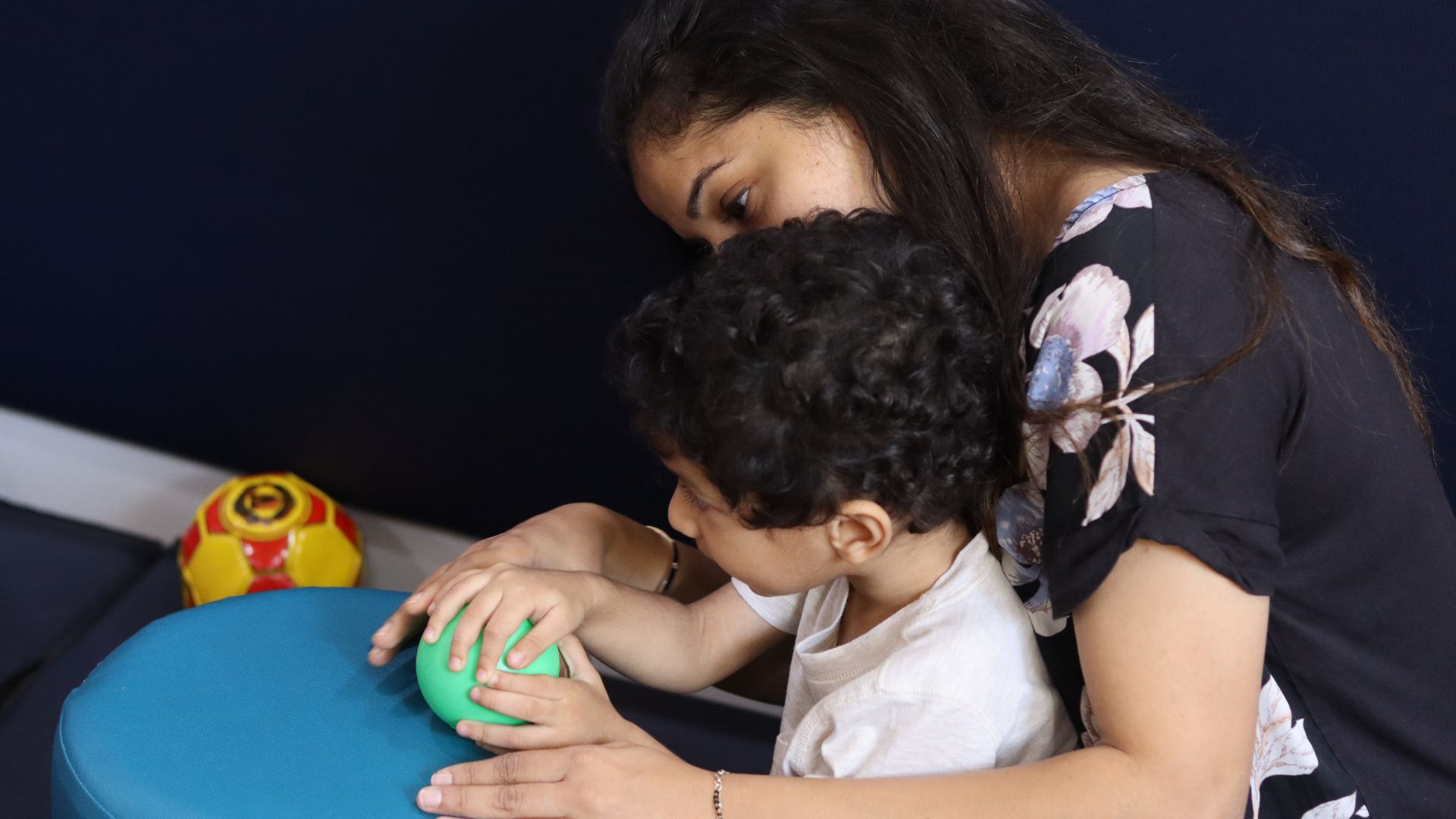 Child smiling in classroom