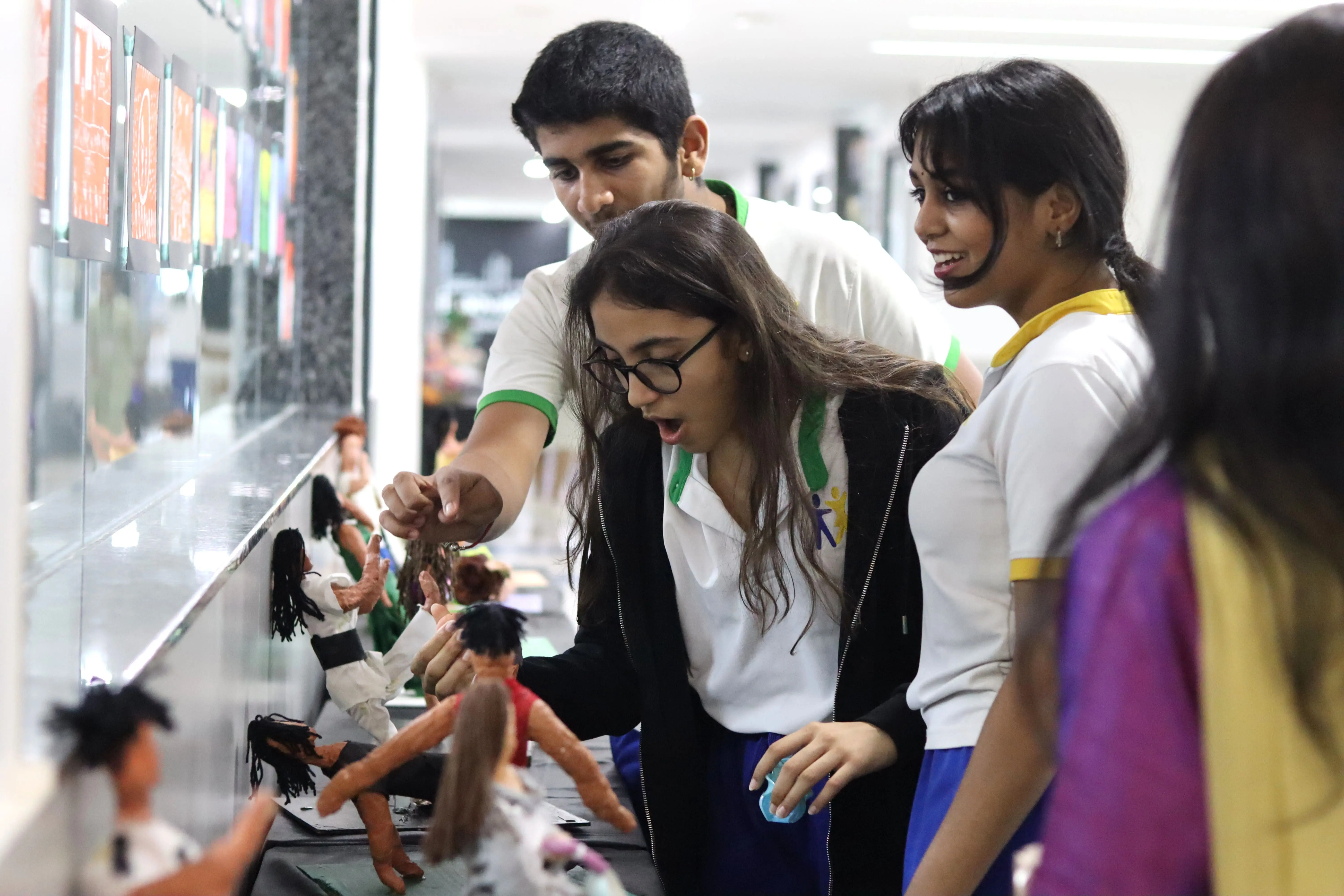 student painting canvas