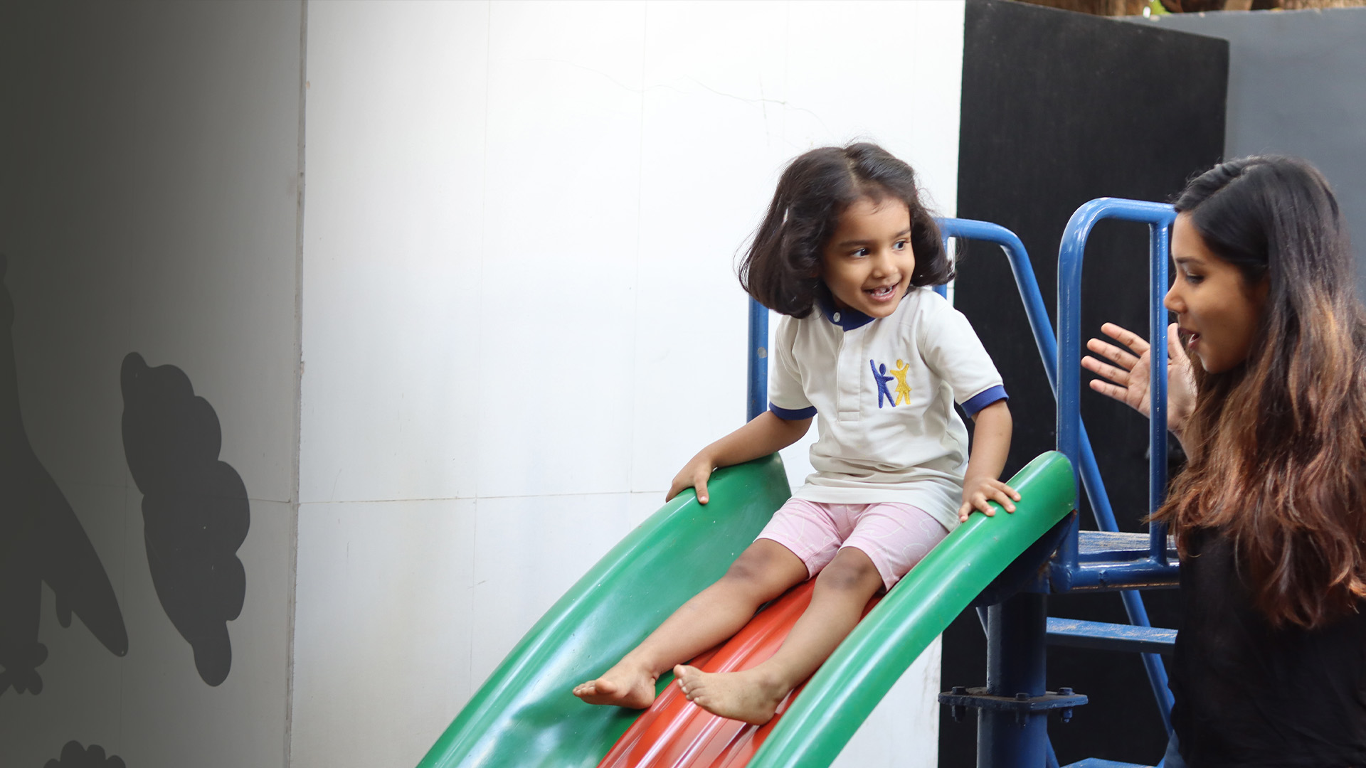 Children collaborating on a project in a bright classroom