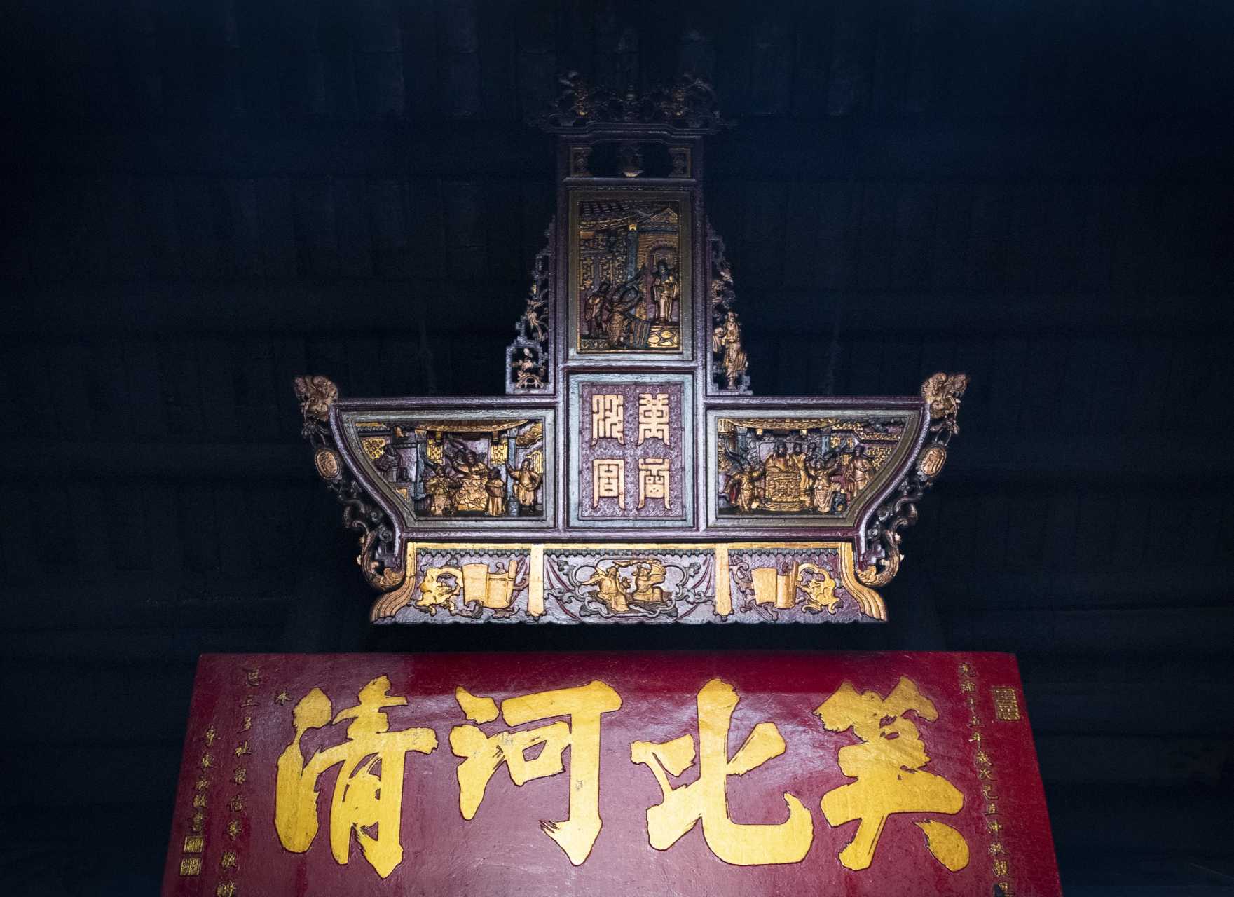 A featured wood carving masterpiece on display.