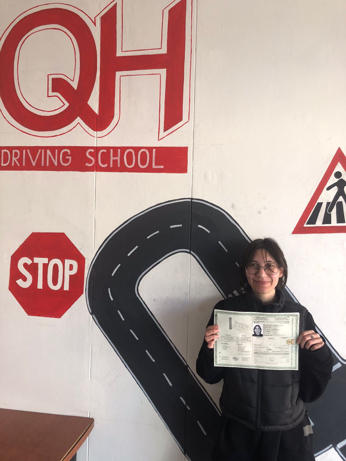 Student receiving a certificate of completion.