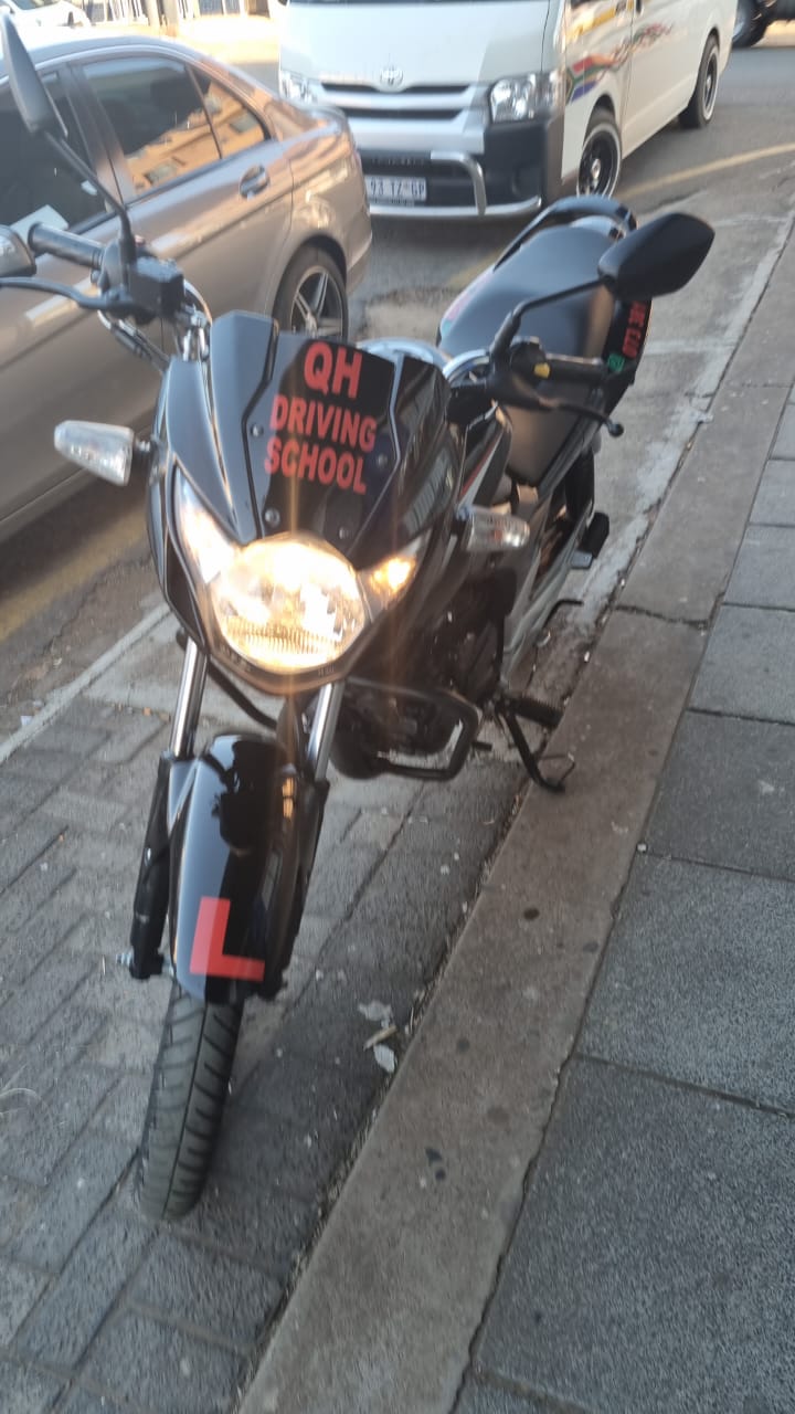 A QH branded motor bike.