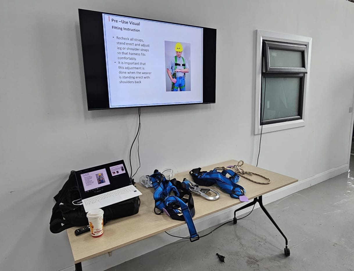 Trainee practicing with safety equipment