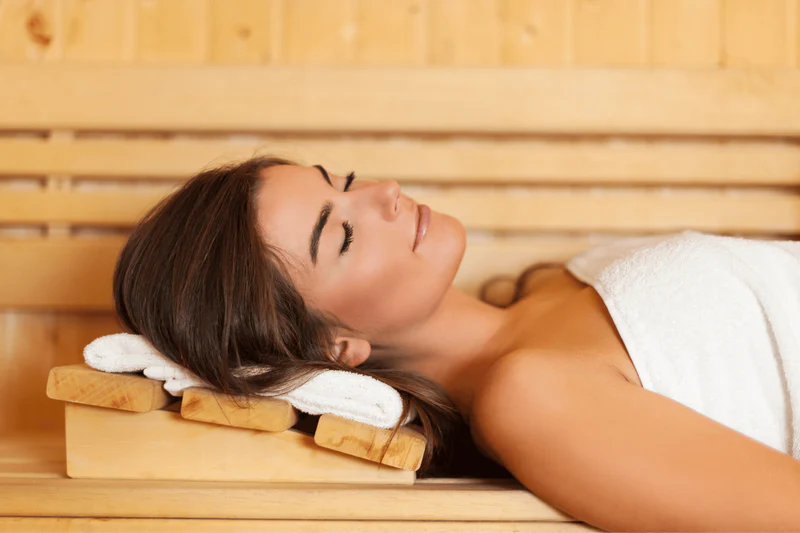 Woman relaxing in a QCA Sauna