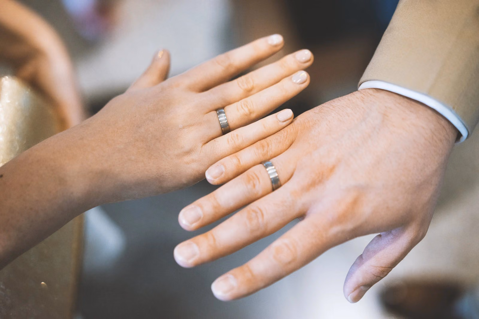 the-midsection-of-the-bride-and-groom-hold-hands-a-2024-09-17-03-02-54-utc