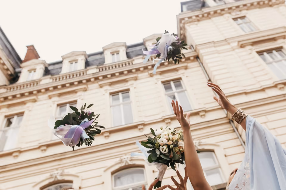 gorgeous-bride-and-bridesmaids-throwing-bouquets-u-2025-04-01-23-51-36-utc