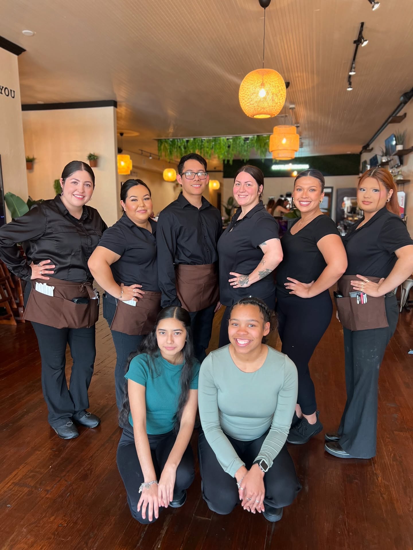 A person holding a large ice cream cone
