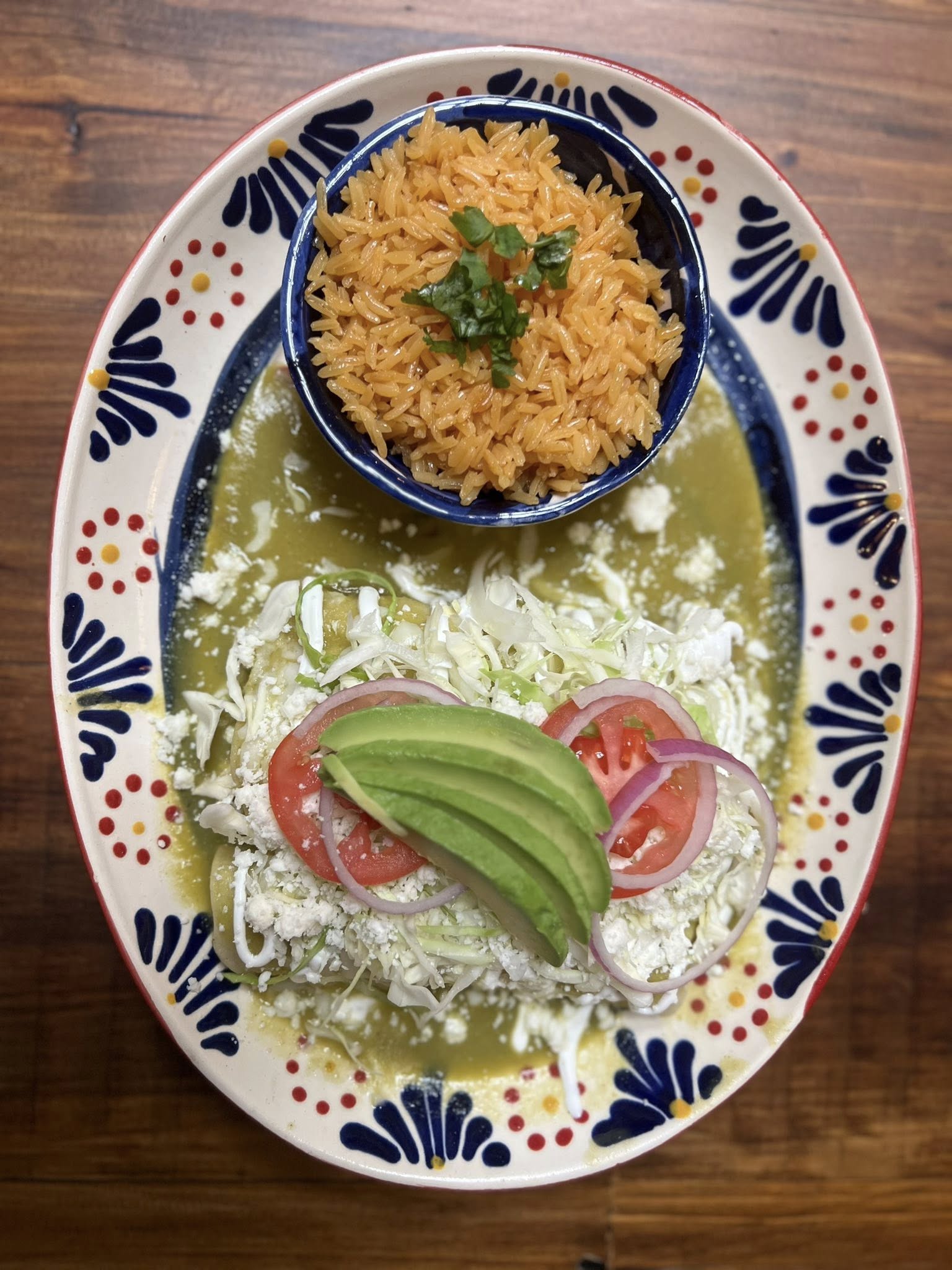 Person holding a plate of food