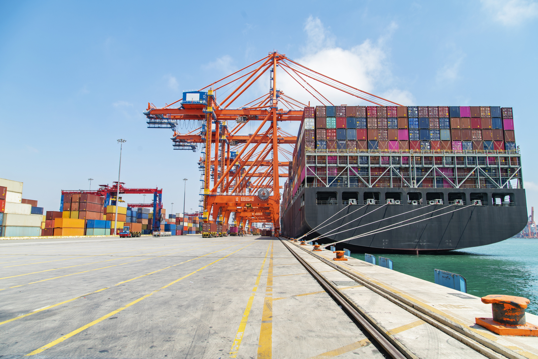 Cargo ship with containers at sea.