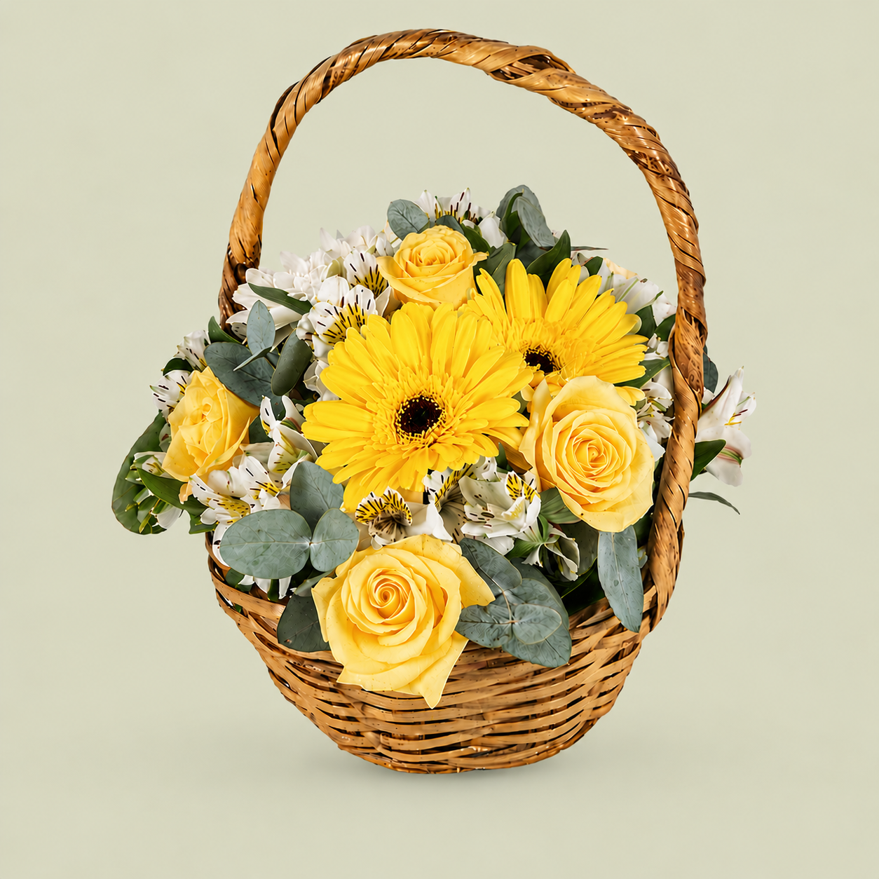 Basket with gerberas and yellow roses