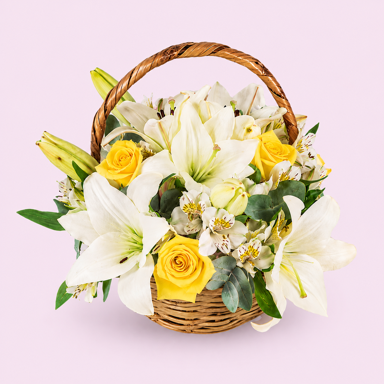 Basket with white lilies and alstroemerias, yellow roses