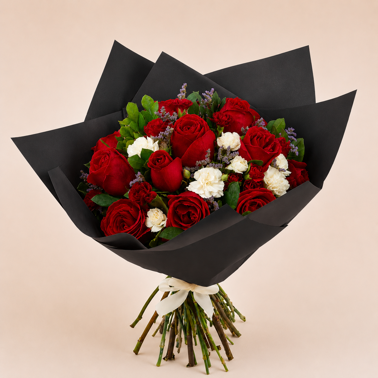 Bouquet of red roses and white mini carnations