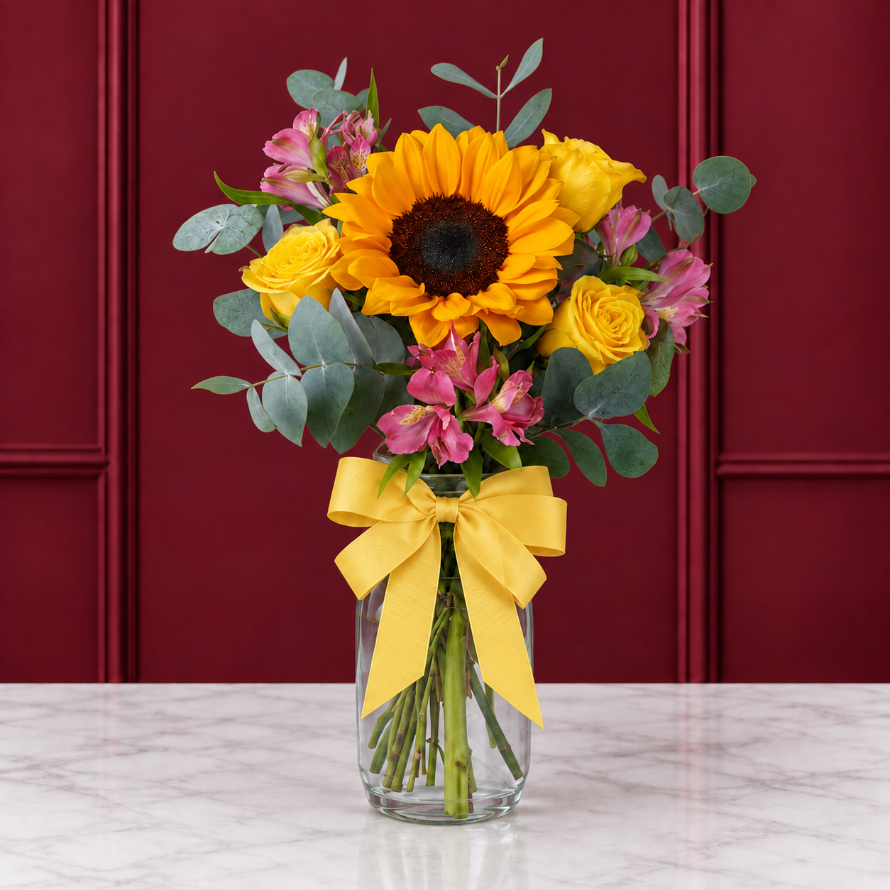 Girasoles, Rosas Amarillas y Alstroemerias en Jarrón con Moño