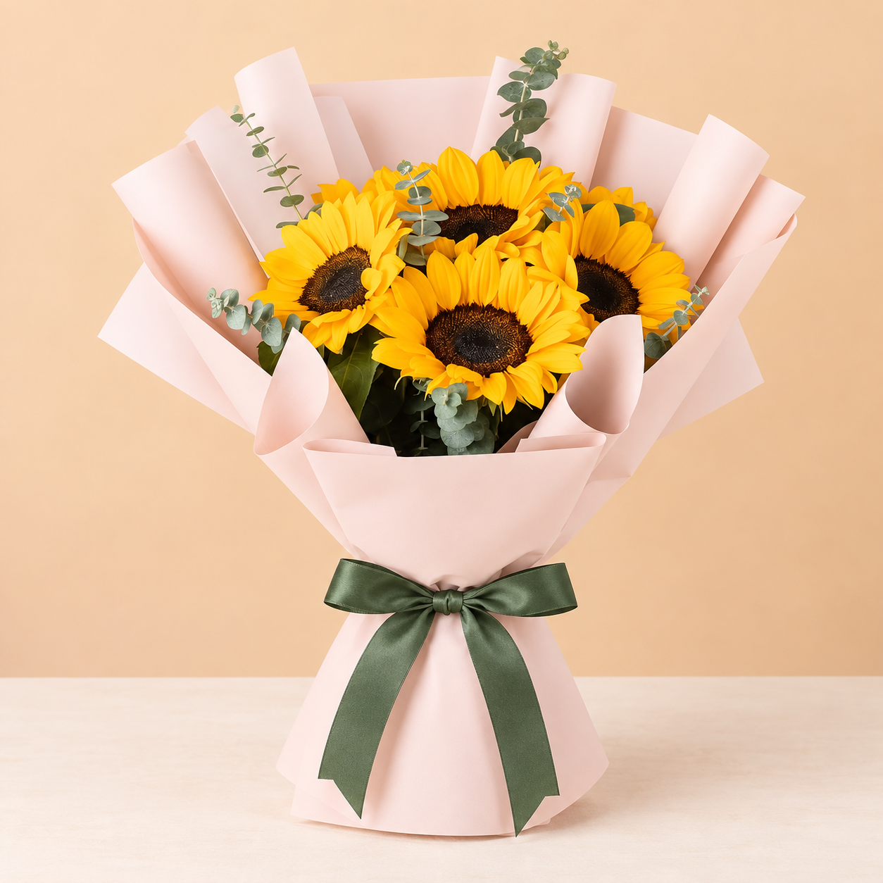Bouquet de Girasoles y Eucalipto en Papel Rosa